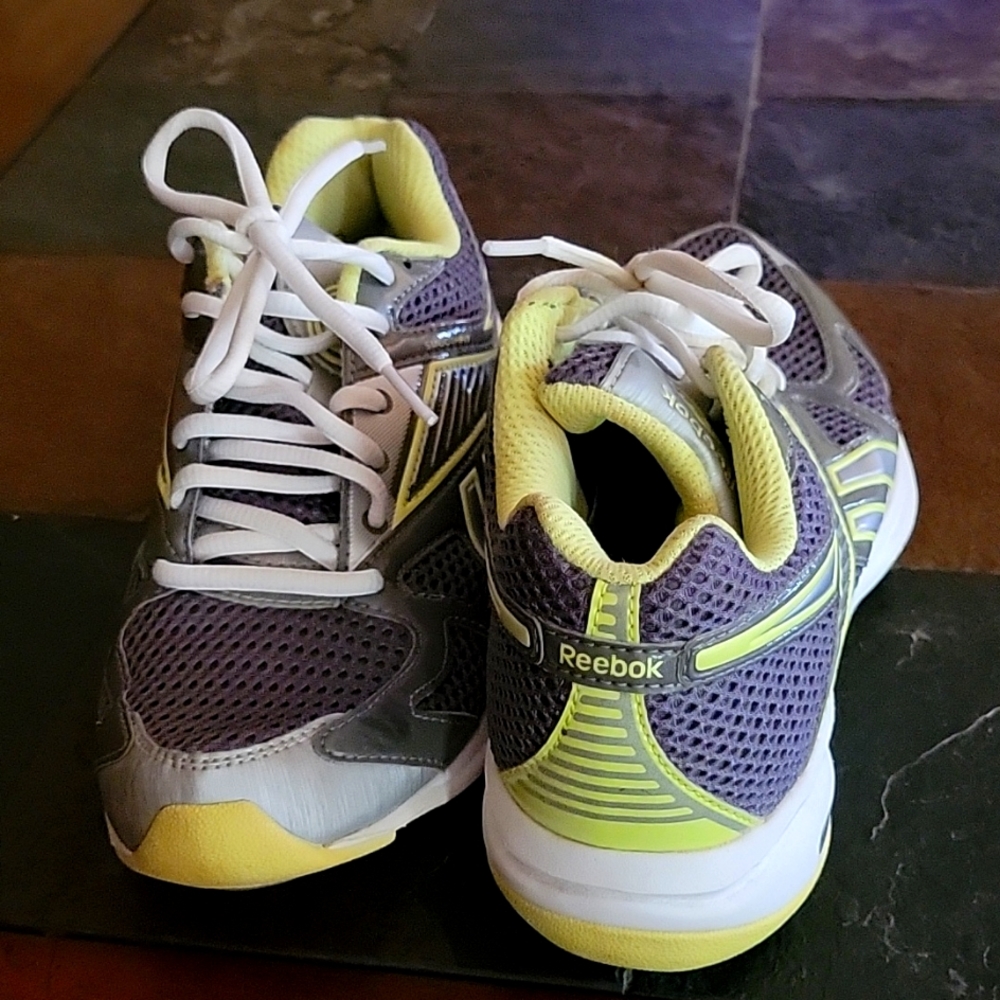 Reebok size 5 gray and neon green Tennis shoe.